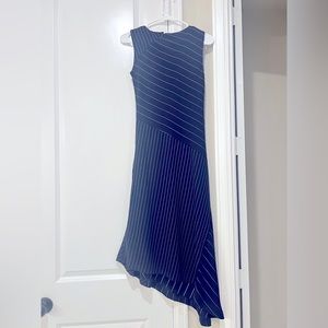 DKNY sleeveless Dress with asymmetrical detail.